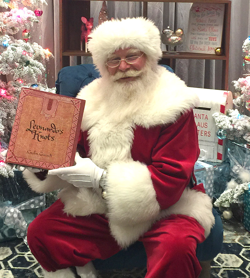santa-w-book santa-w-book